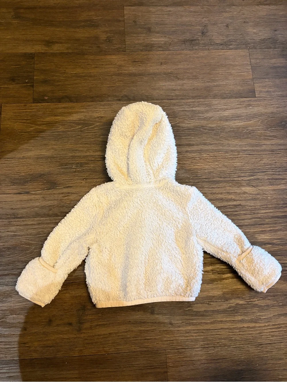 The North Face plush cream